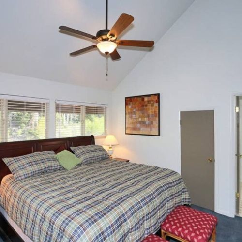King-sized bed in the loft with full bathroom, walk-in closet, kids nook...
