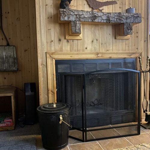 Yes, a real wood burning fireplace.  Wood provided.