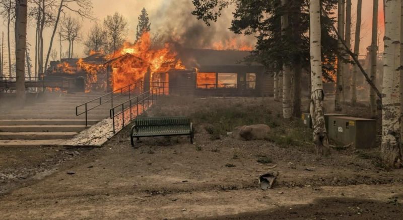 The Main Lodge At Eagle Point Burning During The Cottonwood Fire