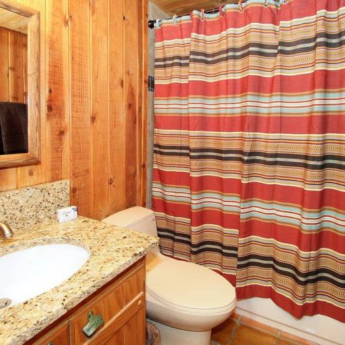 Bathrooms feature granite counter tops, tub/shower combinations.
