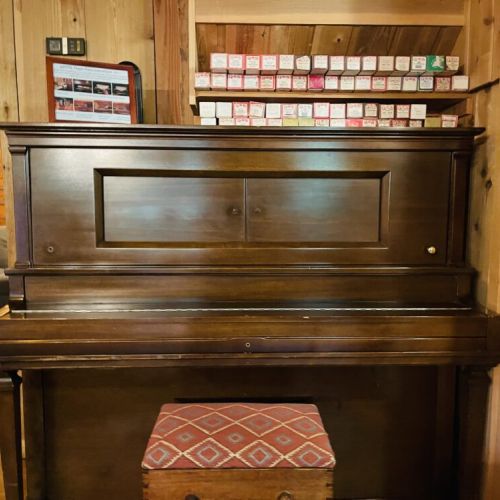 Try out the player piano with instructions on the top.